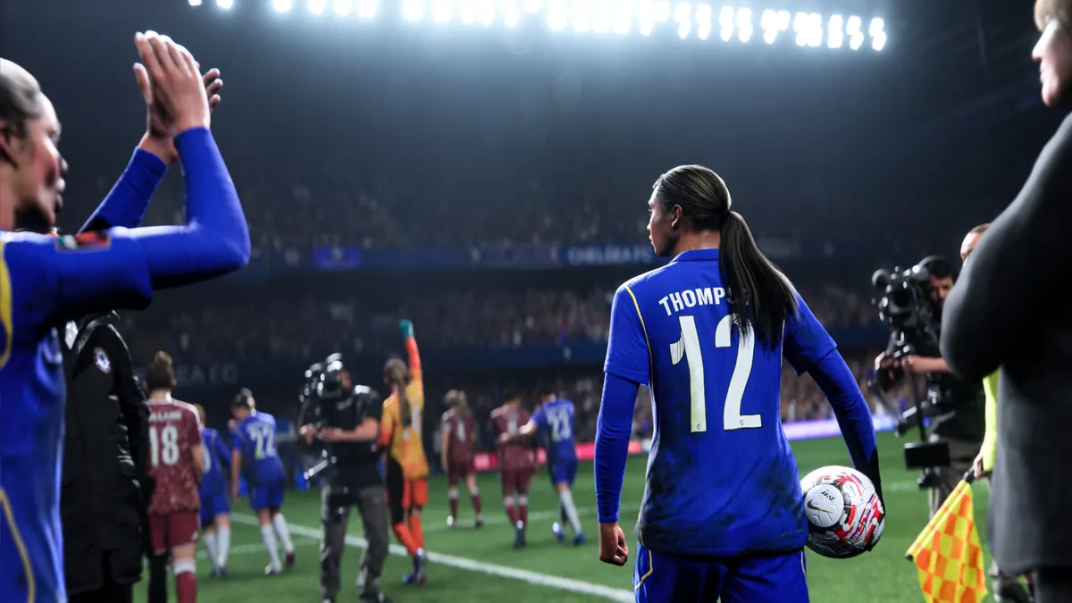 Chelsea player with the ball in an EA SPORTS FC 27 promotional PC game screenshot.